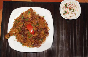 Rs. 35 to get Buy-1-Get-1 offer on biryani of same value at Alapenos Restaurant