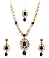 Adhira Elegant Stone Studded Necklace Set With Maang Tika